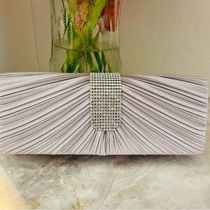 Silver pleated satin clutch bag with rhinestone accent. Wedding. Party. Cocktail